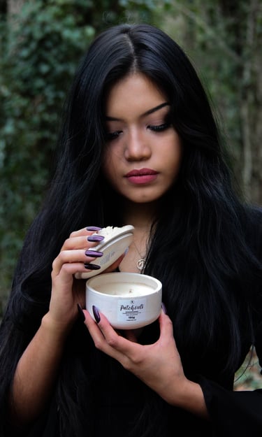 rangliciene showcasing her handmade scented soy candle
