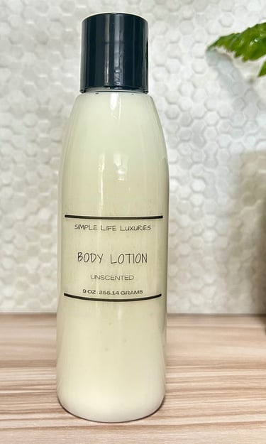 a bottle of body lotion sitting on a table