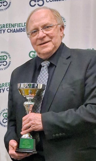 Kenneth Goltz accepting Greater Greenfield Community Chamber Lifetime Achievement Award