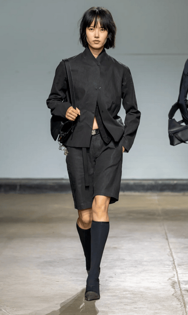 Johanna Parv black shirt and shorts ensemble at London Fashion Week 2026.
