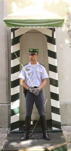 Lisbon - An official guard to a historic building under repair