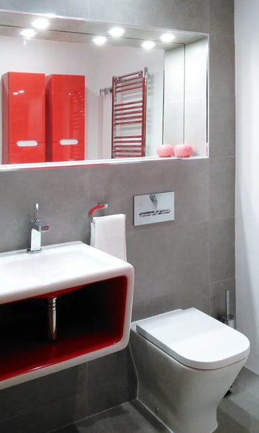 Reforma de baño en tonos rojos, realizado por los mejores interioristas de Valencia