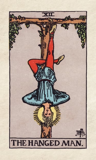 The Fool Meets The Hanged One: The Sacred Pause and the Alchemy of Surrender