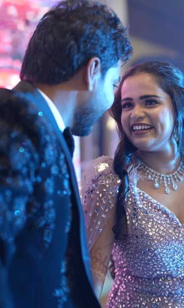 "Engagement stage décor with romantic lights and floral theme"