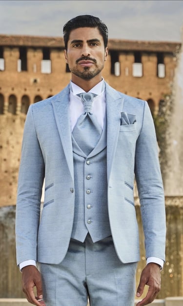 Dany Peña international male model in blue formal suit in Milan Italy