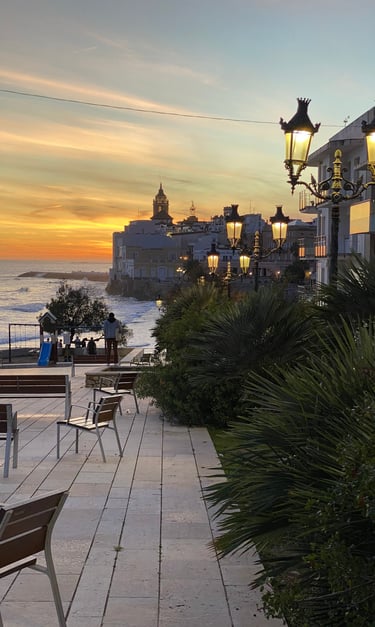 sunset view at Sitges beach and promenade