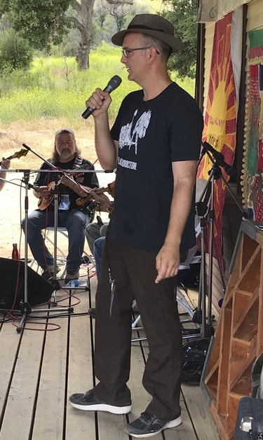 Jeremy Grant Horton Calling a Square dance at the Topanga Fiddle Conest.