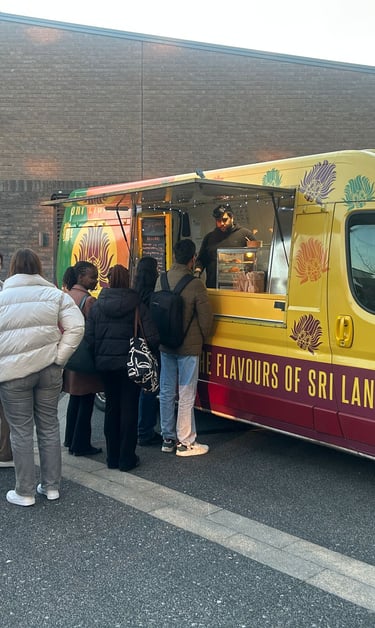 Sri-Licious food van with a queue