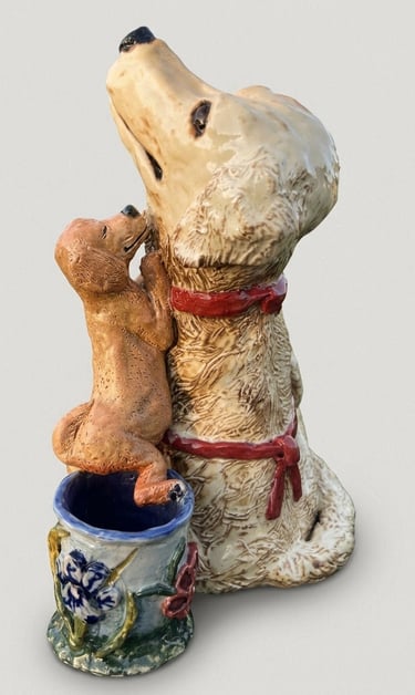 Hand-sculpted ceramic Golden Retriever artist sculpture in warm honey glazes.