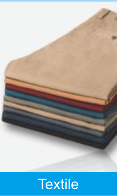 a pile of colored paper towels with a blue background