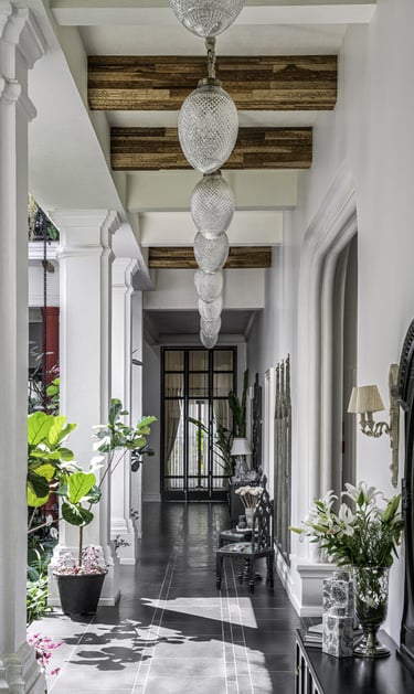 a hallway with a mirror and a mirror