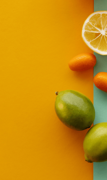 a variety of fruits and vegetables on a colorful background