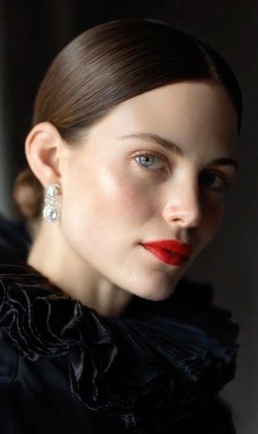 Sophisticated wedding hair and makeup with timeless elegance and polished styling.