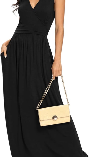 a woman in a black dress with a purse