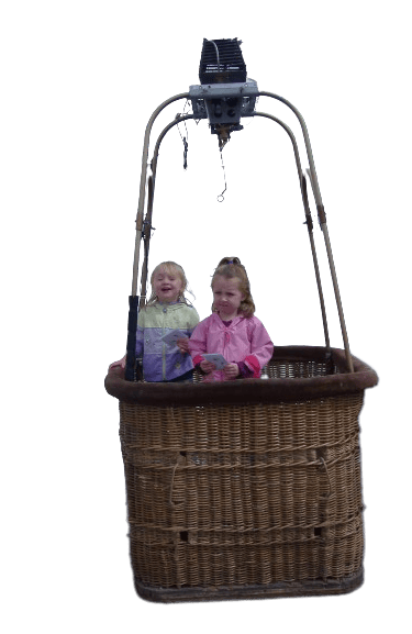 The twins in a hot air balloon gondola
