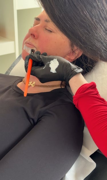Lip blush treatment in progress at Inkglow Durham studio