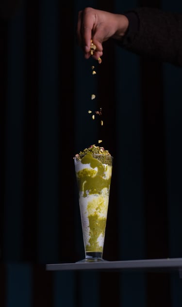 Aesthetic dessert videography featuring a pistachio milkshake with crushed nuts for Instagram Reels.