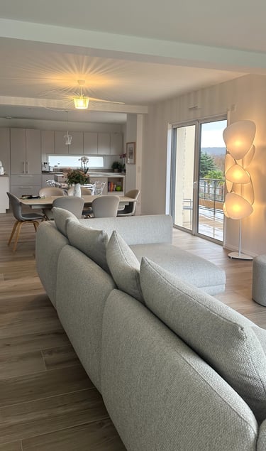 a living room with a couch and a table