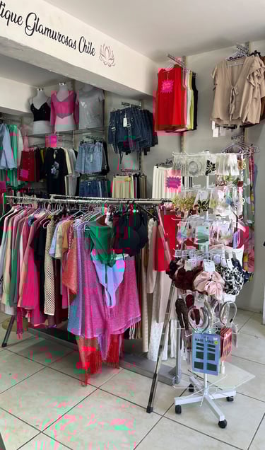 a clothing store with clothes and clothing on display