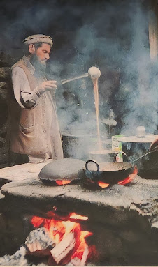 A Pakistani Man Making a traditional tea