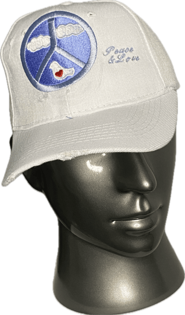 White baseball cap with embroidered blue peace sign and Peace and Love text on a mannequin head.