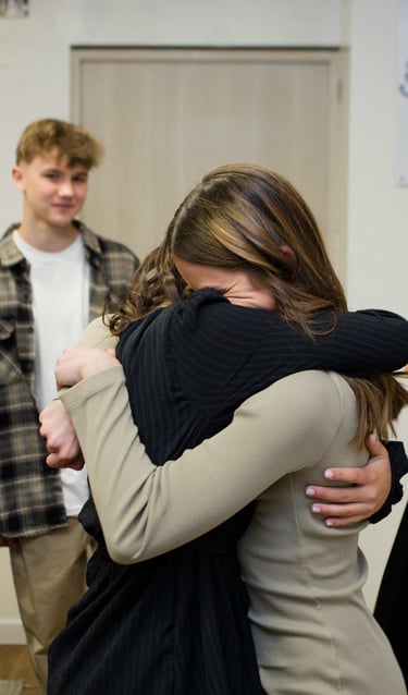 First embrace during an adoption journey in Colombia
