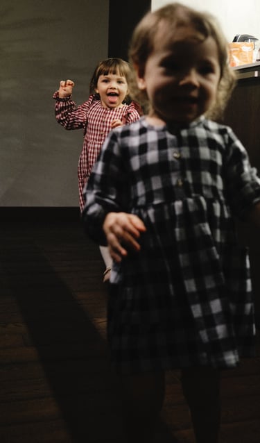 two girl running around in Vaud