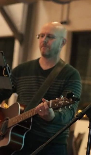 William Finn from Finn's Echo performing in front of live audience