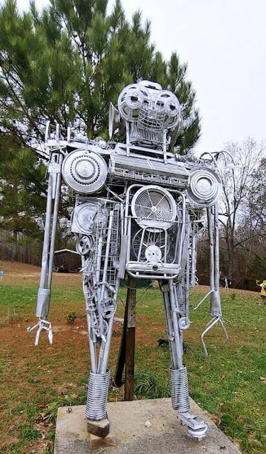 Mentone, AL - A robot made of metal parts on the road up the mountain