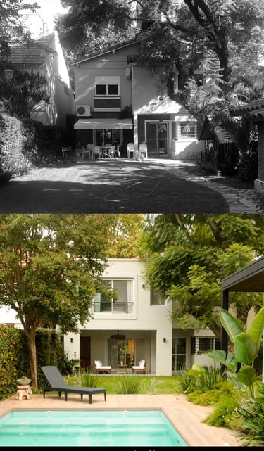 a black and white photo of a house with a pool and a pool