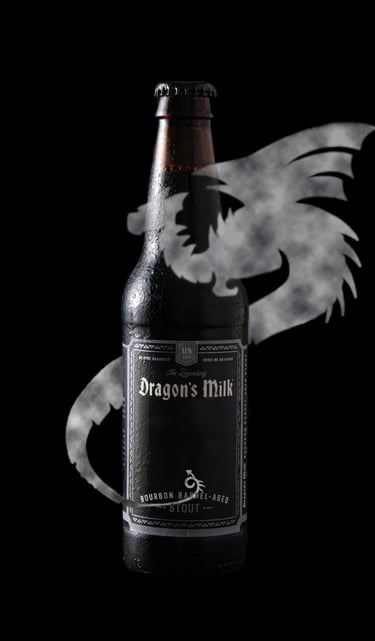 Dragon's Milk from New Holland Brewing Co with the logo coming out and surrounding the bottle