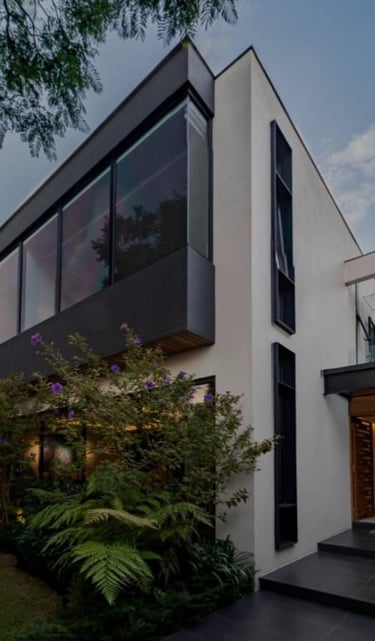 a modern house with a large glass window