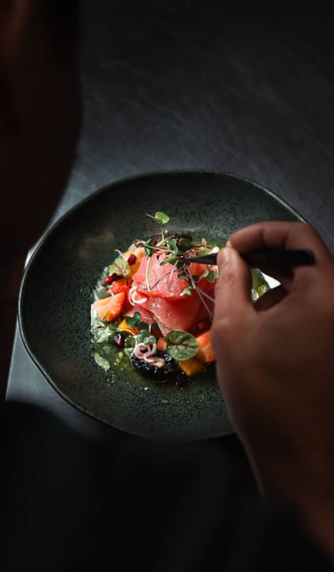Food videographer in Toronto filming a cinematic sizzle reel of a grilled steak.