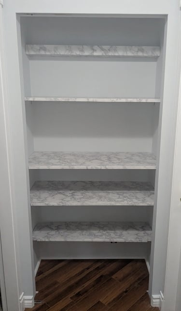 New kitcheware shelves installed, with shelf liner