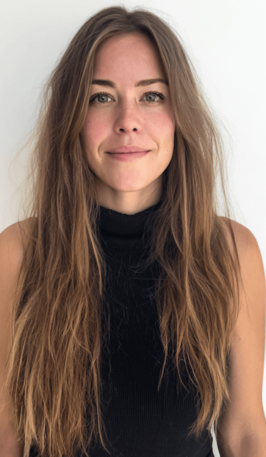 Rich dimensional brunette balayage styled with polished waves.