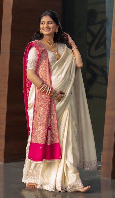 "Beautiful baby shower bride in Vadodara smiling with natural glam makeup by R&D Bridal Studio,