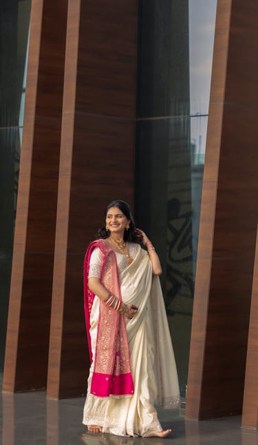 "Beautiful baby shower bride in Vadodara smiling with natural glam makeup by R&D Bridal Studio,