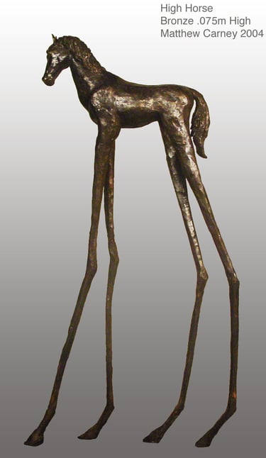 a bronze statue of a horse with very long legs