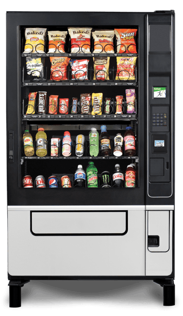Commercial vending machine in an office or breakroom setting.