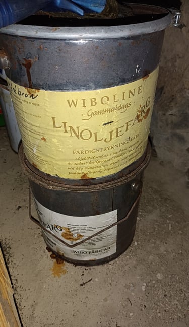Two old linseed oil hinks for natural barn paint