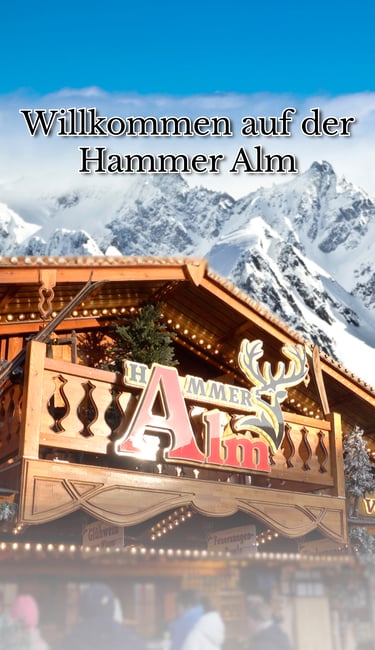 Hammer Alm auf einem Weihnachtsmarkt vor dem Hintergrund schneebedeckter Berggipfel