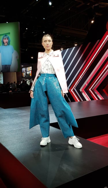 Model on fashion show runway.