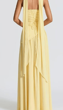 yellow back of the dress with corset tie in back