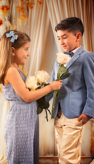 a boy and girl in a blue dress
