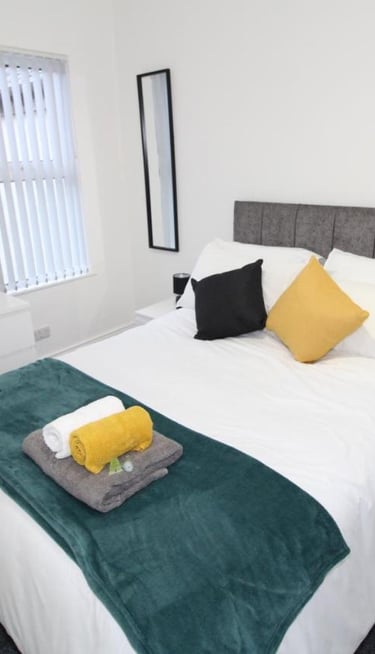 Double bedroom with white walls