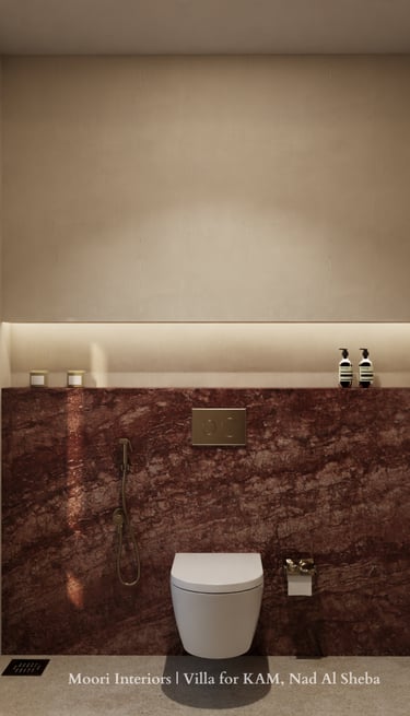 Modern bathroom featuring Emperador marble walls and a white toilet.