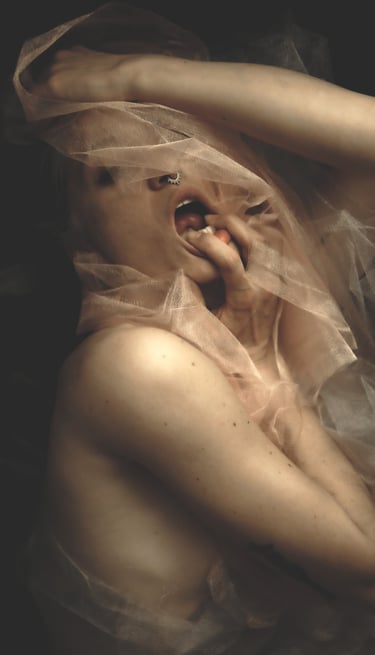 a woman with a veil on her head and a veil on her head