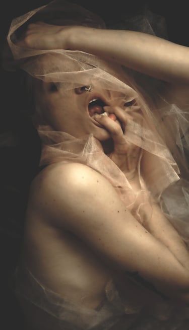 a woman with a veil on her head and a veil on her head