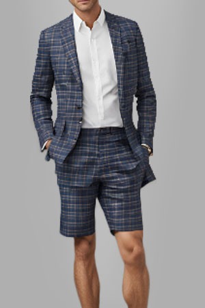 a man in a plaid suit and white shirt