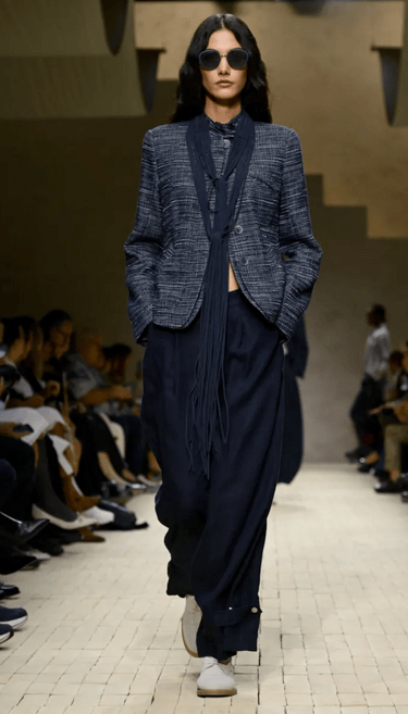 Armani Spring Summer 2026 – Tailored navy blazer with relaxed pants.